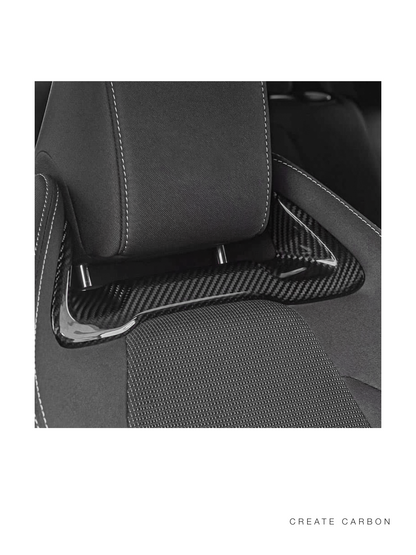 Toyota GR Corolla dry carbon headrest garnish installed fitment view