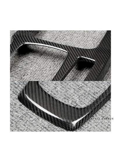 Dry carbon fiber center console panel trim installed in Acura Integra Type S DE5